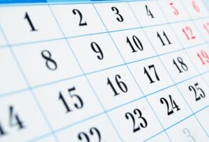 Close up of a calendar page, representing timeframes for an expedited divorce process in Ontario.